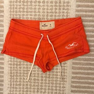 Hollister Women's Vibrant Orange short Shorts.